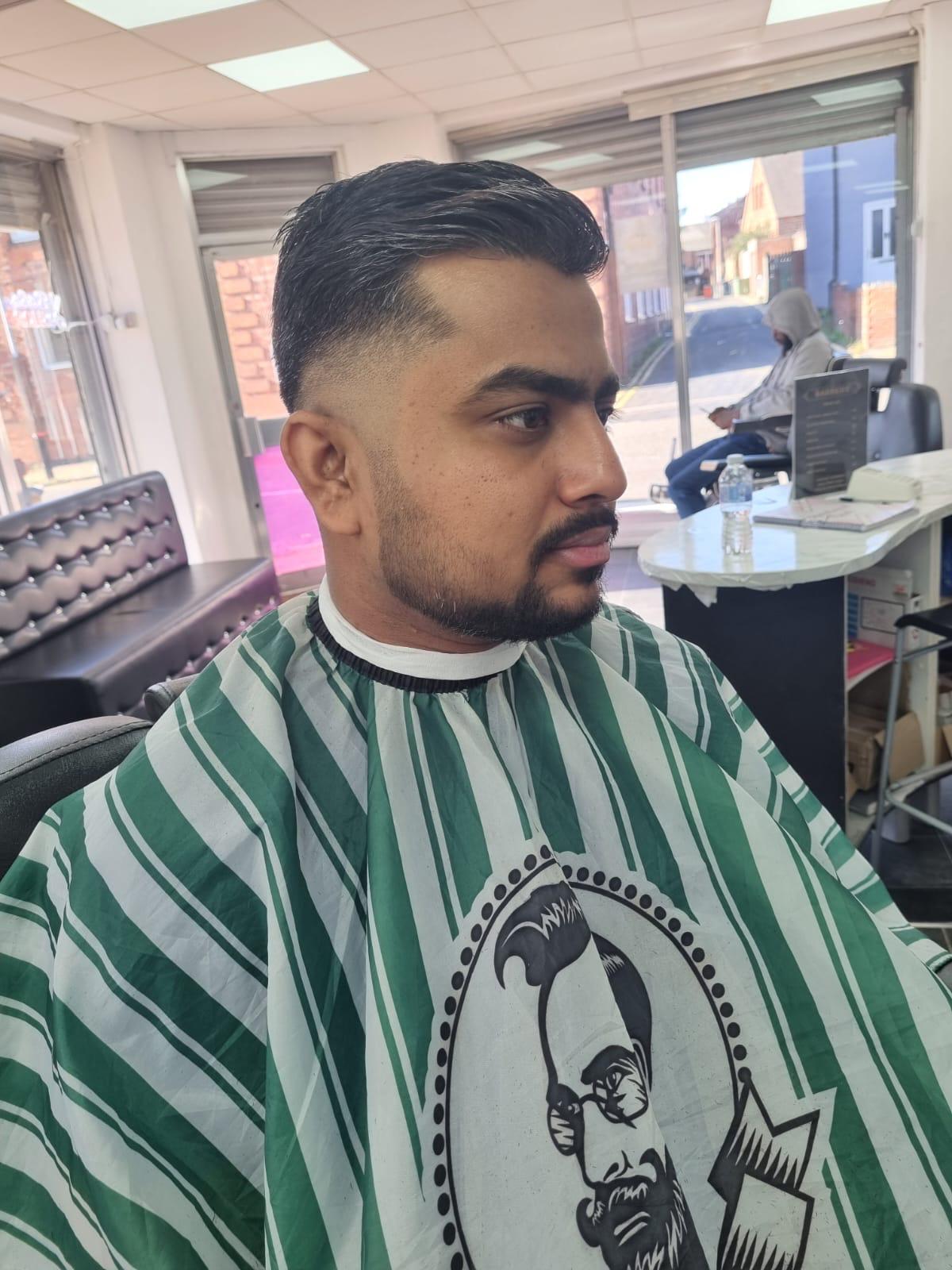 Tapered fade with styled top