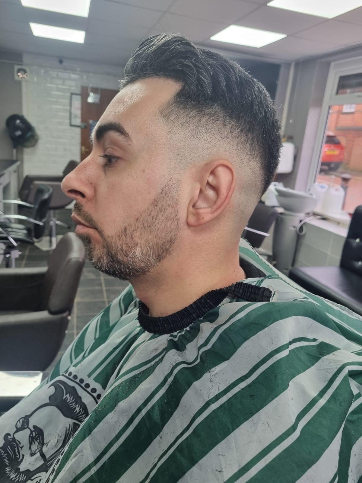 Clean fade with beard trim