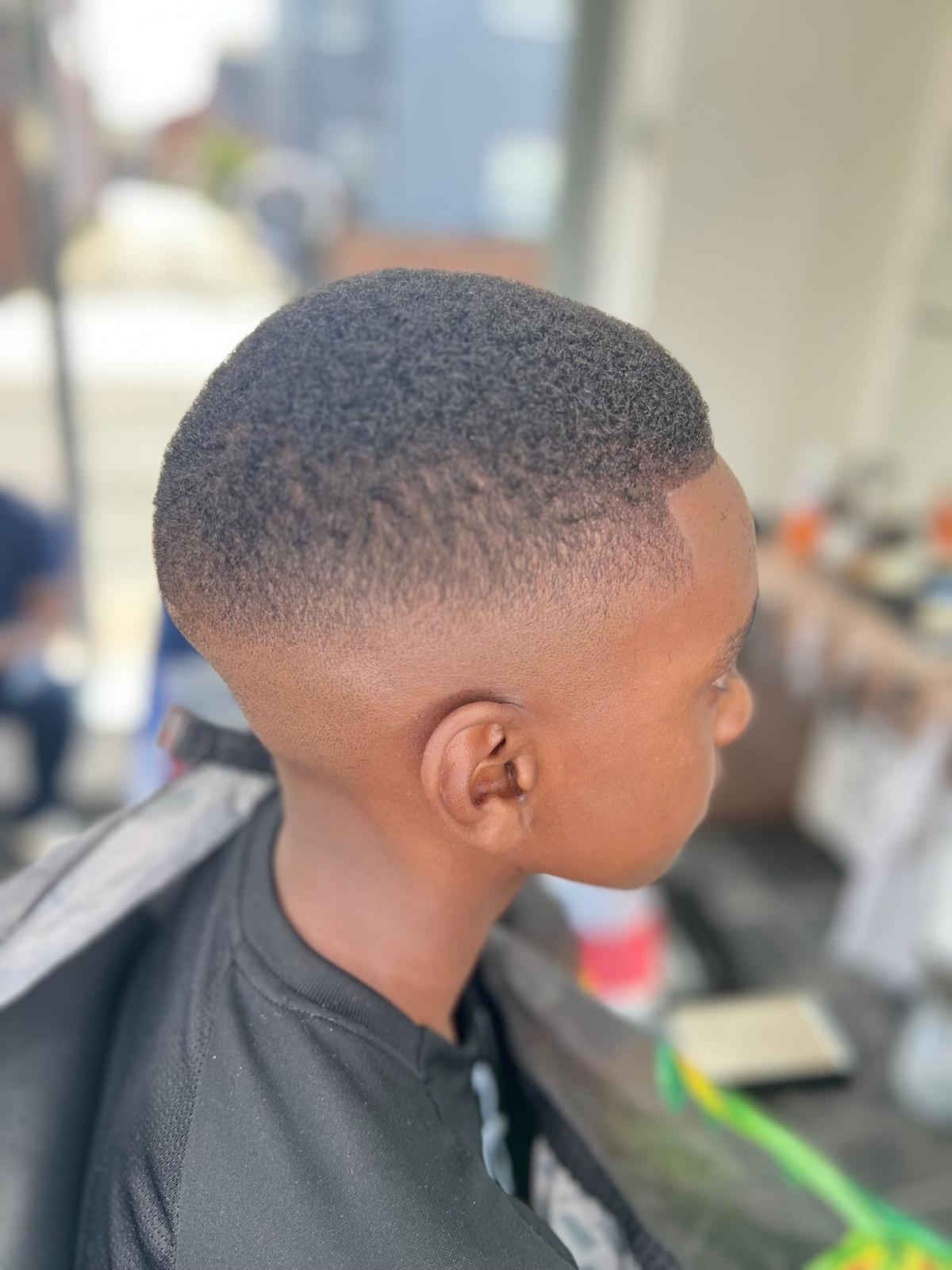 Low fade haircut side profile
